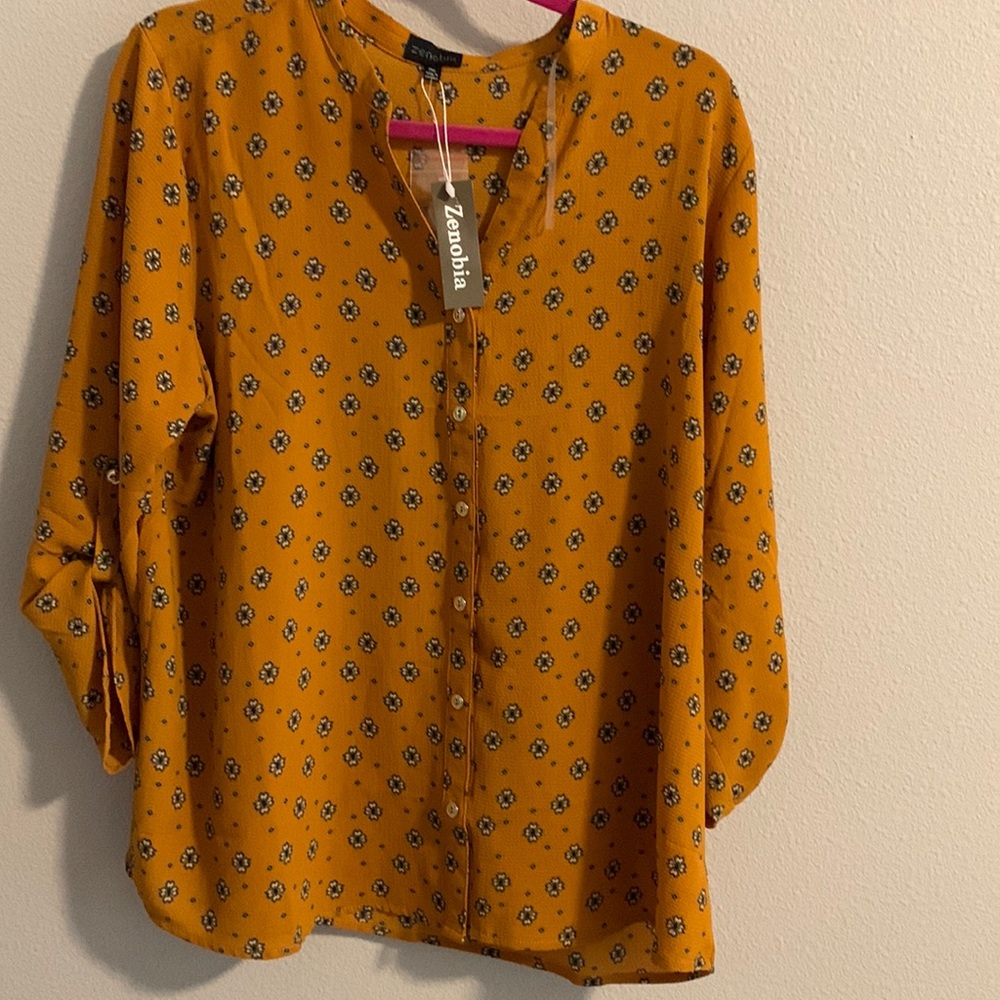 Women’s gold print blouse